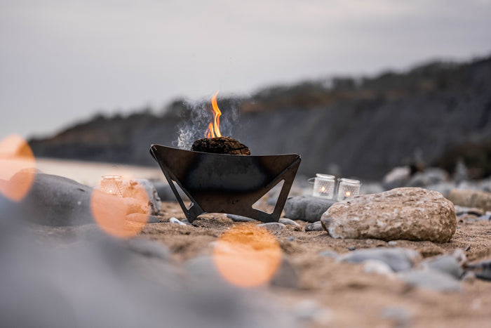 fire pit on the beach