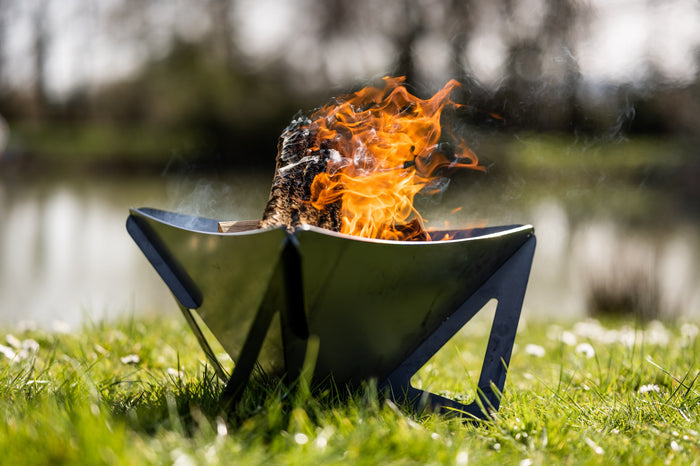 fire pit on the grass