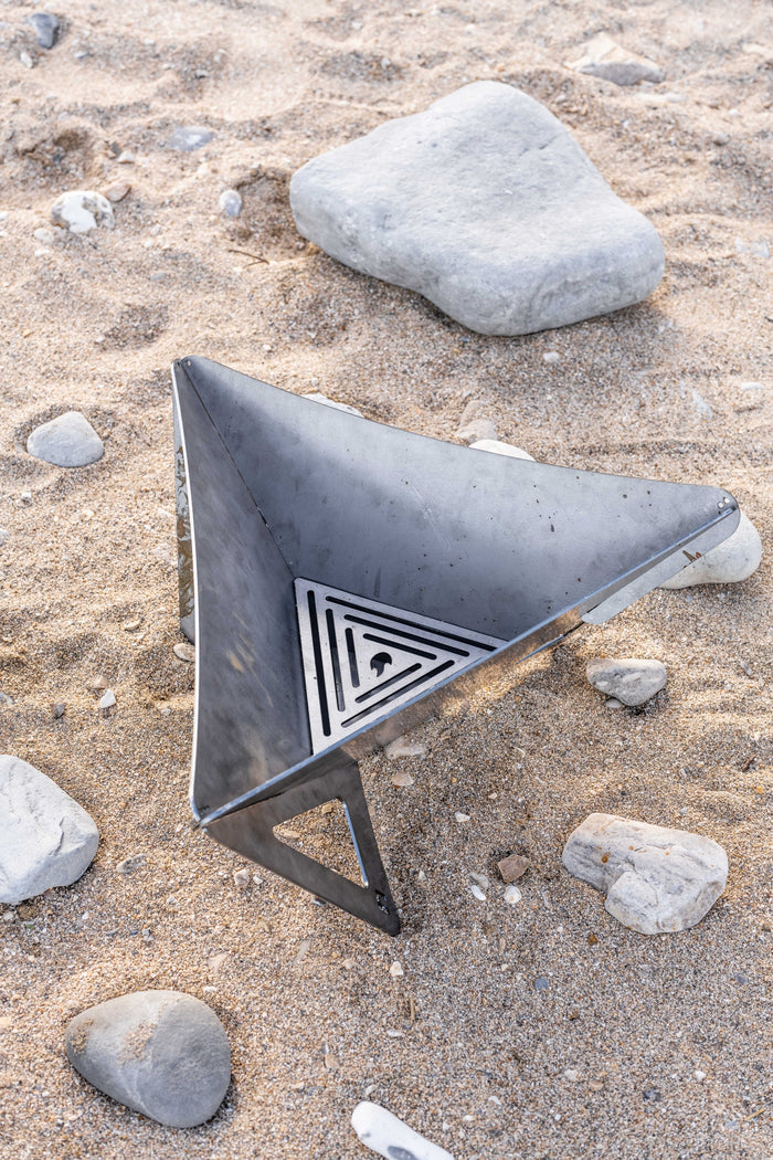 fire pit on the beach