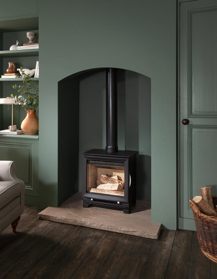 feet extender for a multifuel stove, stove in living room