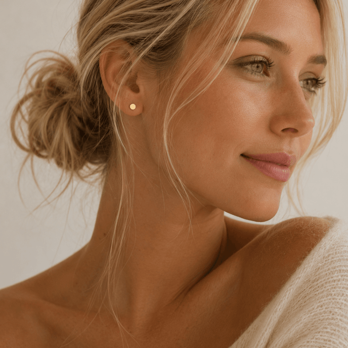 Thumbtack Studs worn as minimalist earrings